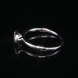 New 14 Karat White Gold Bezel Set  .72 ct Lab Grown Oval East/West Solitaire