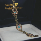 Vintage c.1940 14K Green & Rose Gold Blue Zircon Flower Bracelet